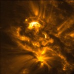 Magnetic loops span active regions on the surface of the Sun. Image by the satellite TRACE.